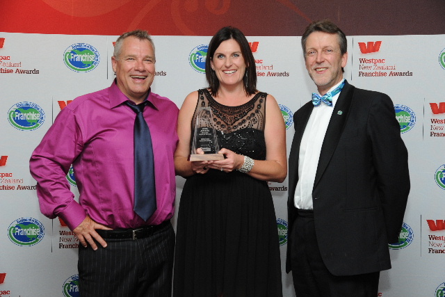 Logan Sears of Green Acres, the Home Services Franchise System of the Year, with Green Acres Auckland manager Raewyn Caines and sponsor Simon Lord of Franchise New Zealand. Logan Sears of Green Acres, the Home Services Franchise System of the Year, with Green Acres Auckland manager Raewyn Caines and sponsor Simon Lord of Franchise New Zealand.